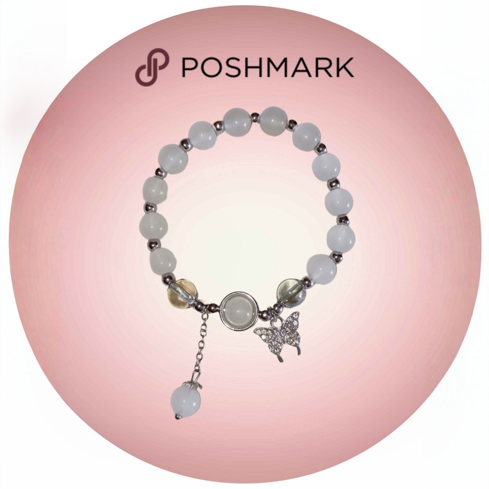 Elegant White Beaded Bracelet with Silver Butterfly Accent